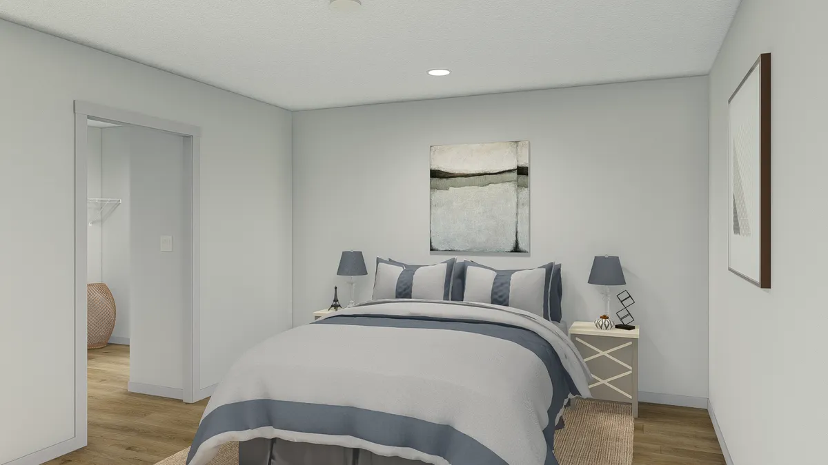The SOLSBURY HILL Master Bedroom. This Manufactured Mobile Home features 3 bedrooms and 2 baths.