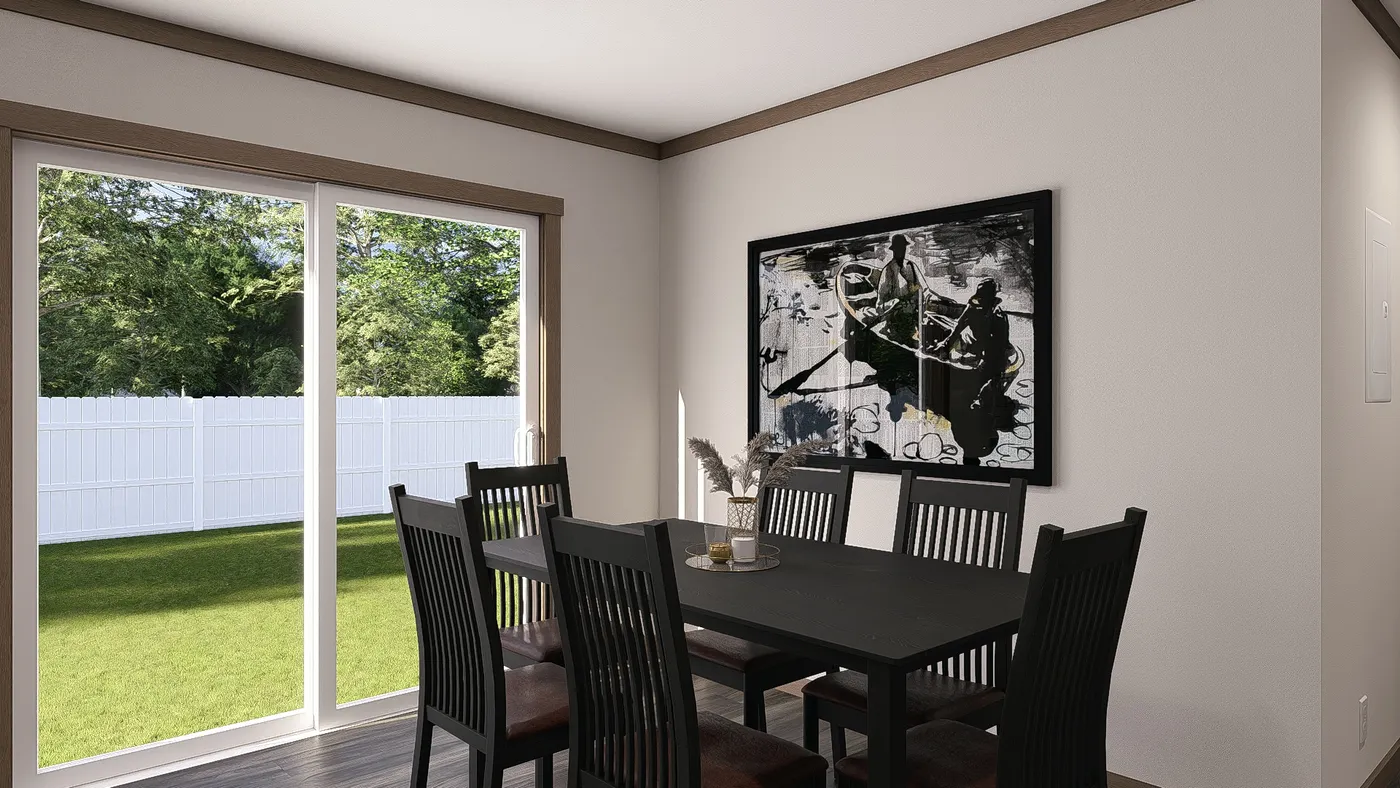 The EVERETT Dining Room. This Manufactured Mobile Home features 4 bedrooms and 3 baths.