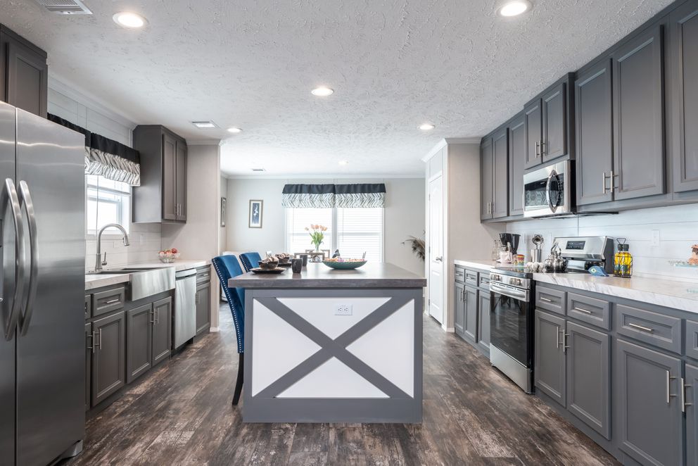 The ALL AMERICAN Kitchen. This Manufactured Mobile Home features 3 bedrooms and 2 baths.