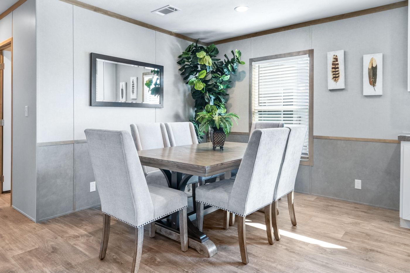 The PT 78 Dining Room. This Manufactured Mobile Home features 3 bedrooms and 2 baths.