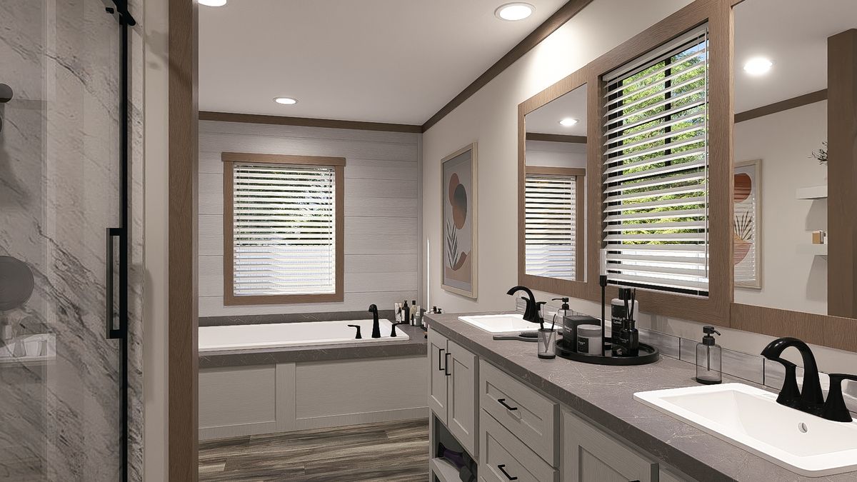 The SAWYER ELITE Primary Bathroom. This Manufactured Mobile Home features 3 bedrooms and 2 baths.