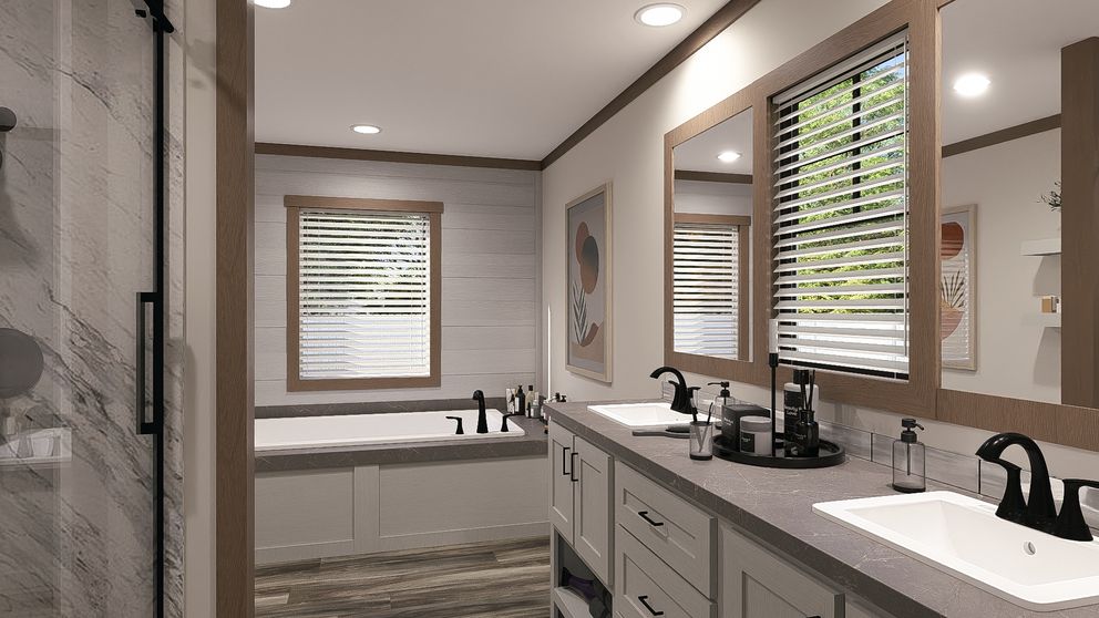 The SAWYER ELITE Primary Bathroom. This Manufactured Mobile Home features 3 bedrooms and 2 baths.