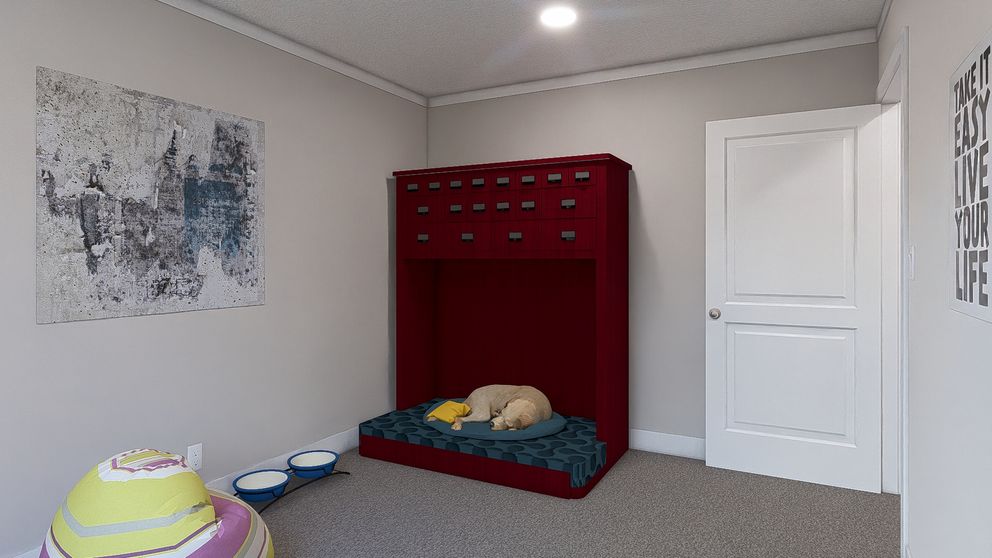 The ROCKET MAN Guest Bedroom. This Manufactured Mobile Home features 3 bedrooms and 2 baths.