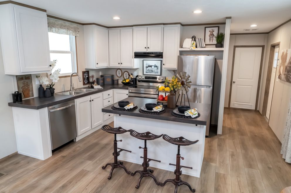 The HORIZON BEACON 16663A Kitchen. This Manufactured Mobile Home features 3 bedrooms and 2 baths.