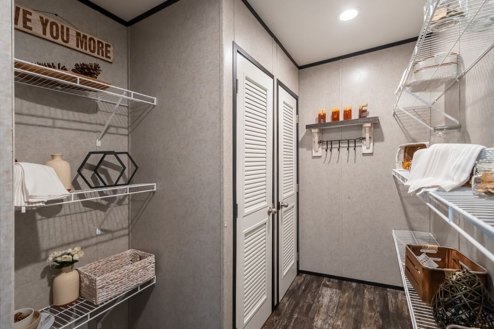 The THE TRIBUTARY Exterior. This Manufactured Mobile Home features 3 bedrooms and 2 baths.