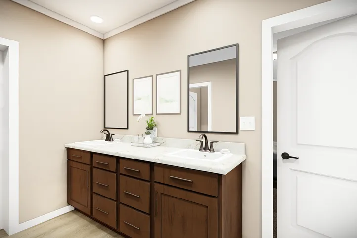 The THE BRYANT Primary Bathroom. This Manufactured Mobile Home features 4 bedrooms and 2 baths.
