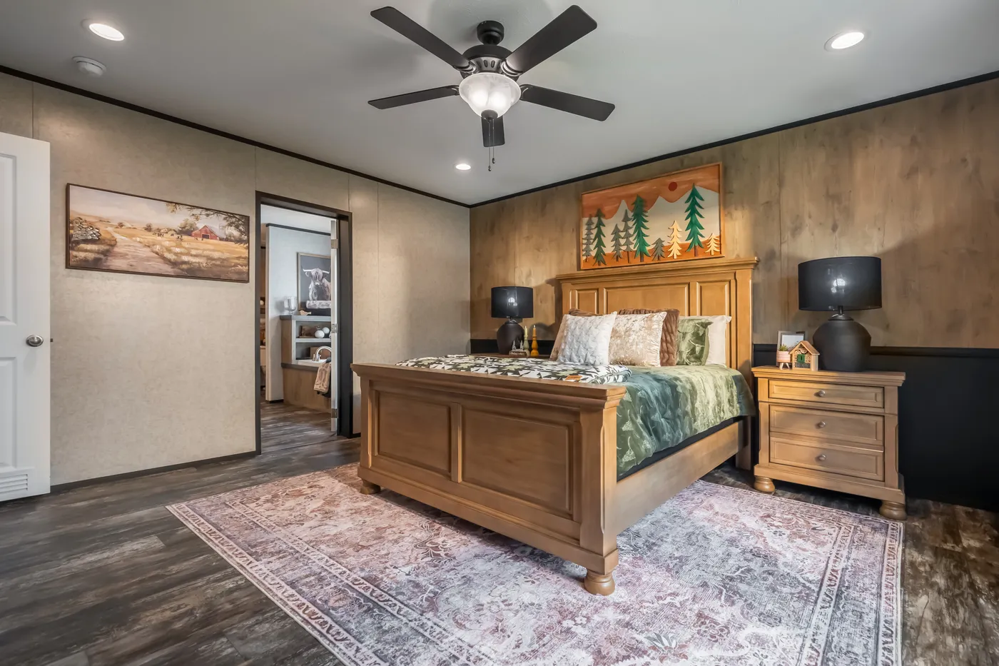 The THE TRIBUTARY Primary Bedroom. This Manufactured Mobile Home features 3 bedrooms and 2 baths.