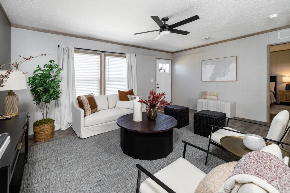 The STERLING ANNIVERSARY Living Room. This Manufactured Mobile Home features 3 bedrooms and 2 baths.