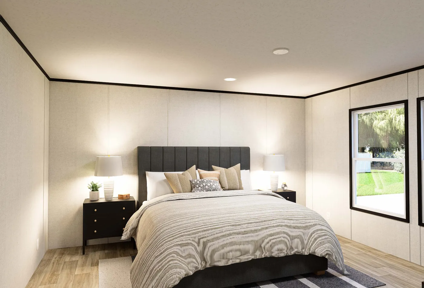 The DAWN Primary Bedroom. This Manufactured Mobile Home features 3 bedrooms and 2 baths.