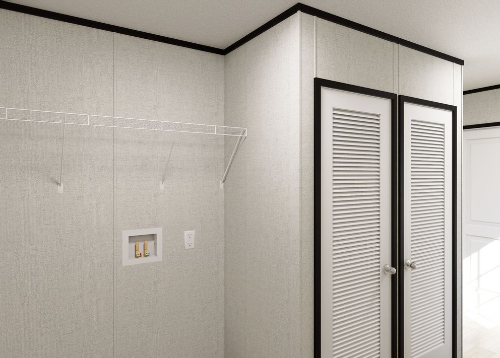 The NORTHSTAR Utility Room. This Manufactured Mobile Home features 3 bedrooms and 2 baths.