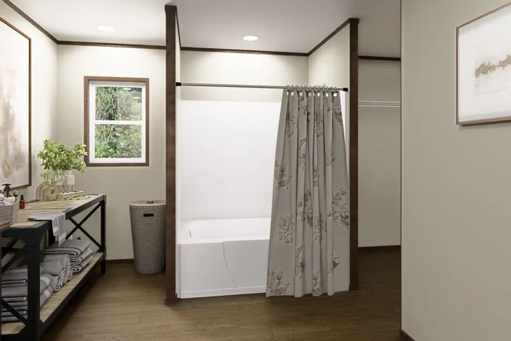 The EVEREST Primary Bathroom. This Manufactured Mobile Home features 4 bedrooms and 2 baths.