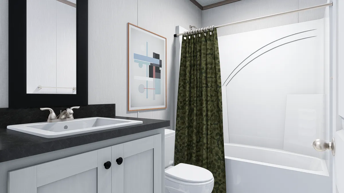 The 6014-4701 THE PULSE Primary Bathroom. This Manufactured Mobile Home features 2 bedrooms and 2 baths.