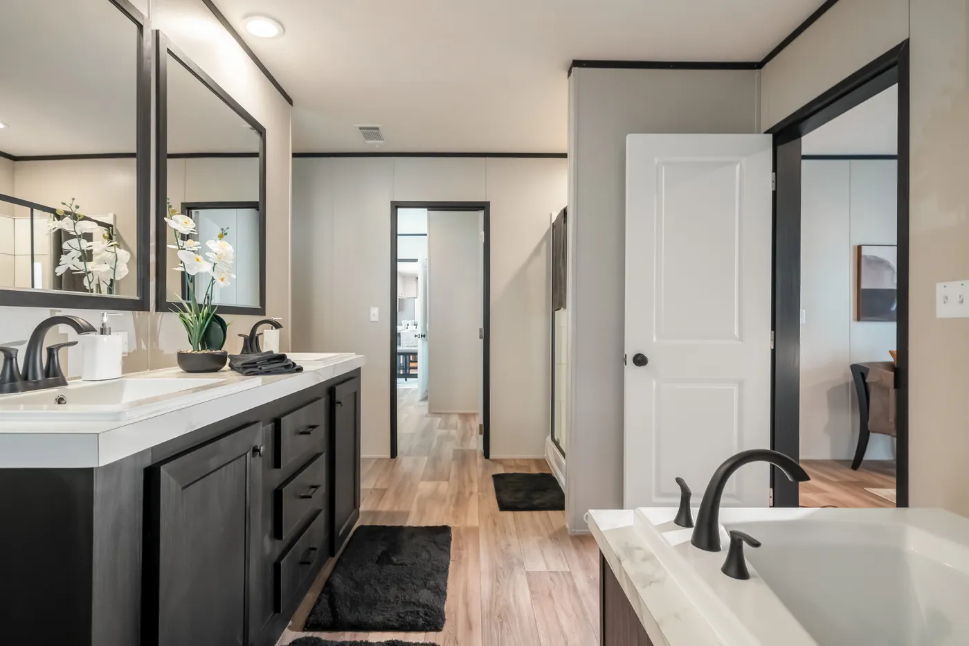 The THE ANNIVERSARY 2.1 Primary Bathroom. This Manufactured Mobile Home features 3 bedrooms and 2 baths.
