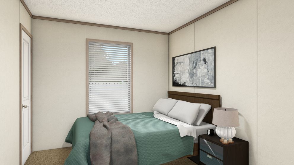 The 7616-4773P THE PULSE Guest Bedroom. This Manufactured Mobile Home features 3 bedrooms and 2 baths.