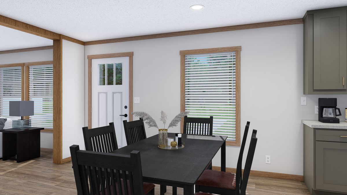 The LAYLA Dining Area. This Manufactured Mobile Home features 4 bedrooms and 2 baths.