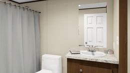 The TRIUMPH Guest Bathroom. This Manufactured Mobile Home features 5 bedrooms and 3 baths.