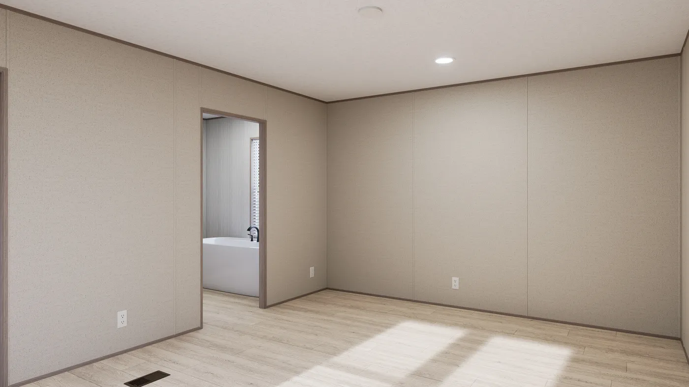The THE ANNIVERSARY 76 Primary Bedroom. This Manufactured Mobile Home features 3 bedrooms and 2 baths.