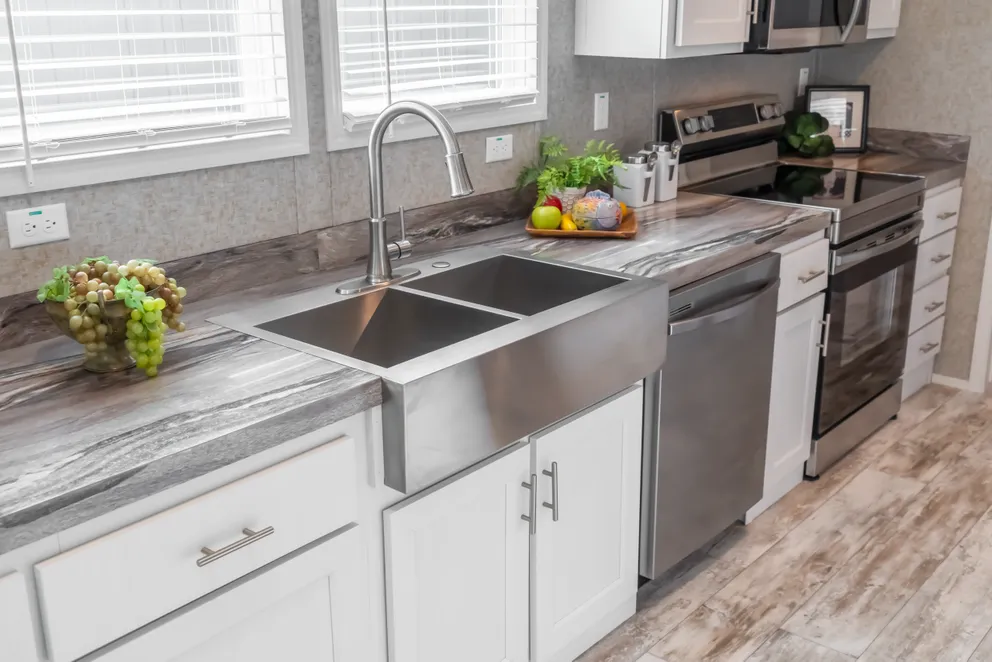 The NUMBER ONE Exterior. This Manufactured Mobile Home features 3 bedrooms and 2 baths.