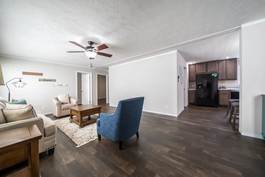 The MAVERICK 56A Living Room. This Manufactured Mobile Home features 3 bedrooms and 2 baths.