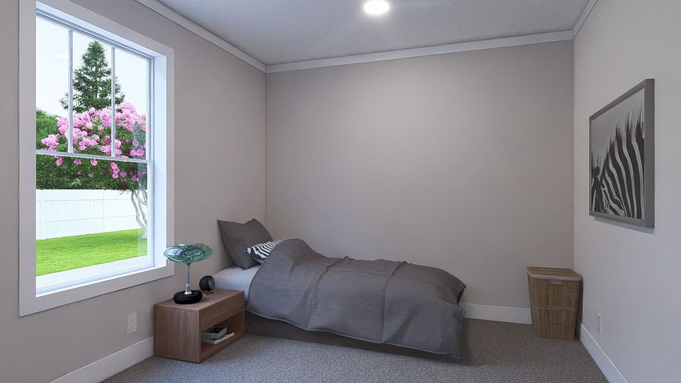 The BROWN EYED GIRL Guest Bedroom. This Manufactured Mobile Home features 4 bedrooms and 2 baths.