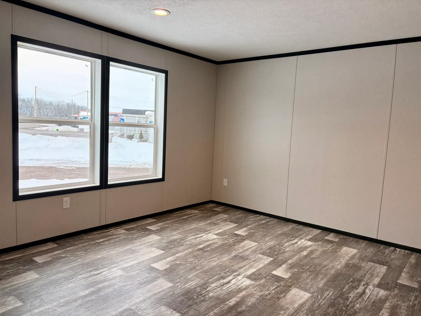 The DIAMOND Living Room. This Manufactured Mobile Home features 3 bedrooms and 2 baths.