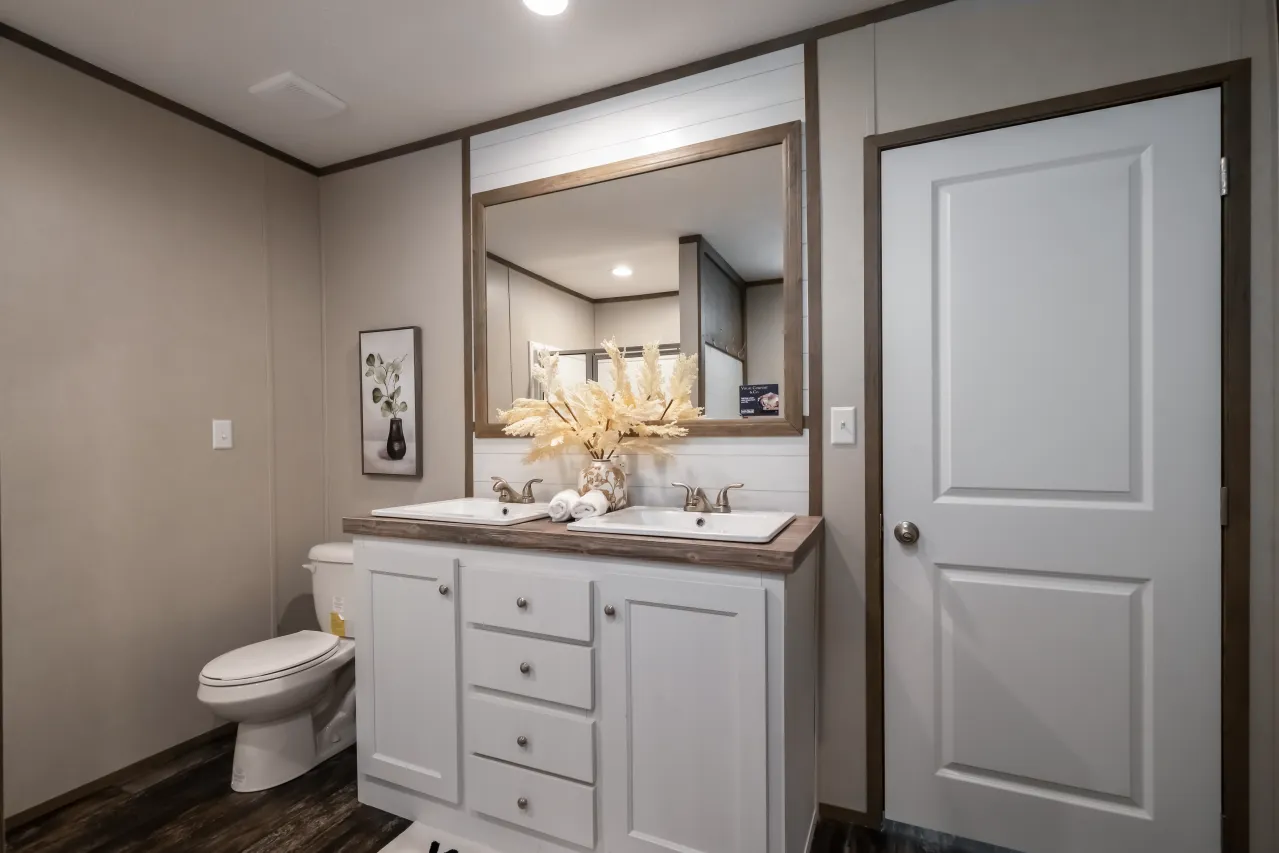 The ANNIVERSARY ENTERTAINER Exterior. This Manufactured Mobile Home features 3 bedrooms and 2 baths.