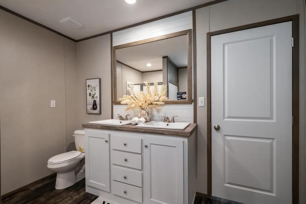 The ANNIVERSARY ENTERTAINER Exterior. This Manufactured Mobile Home features 3 bedrooms and 2 baths.