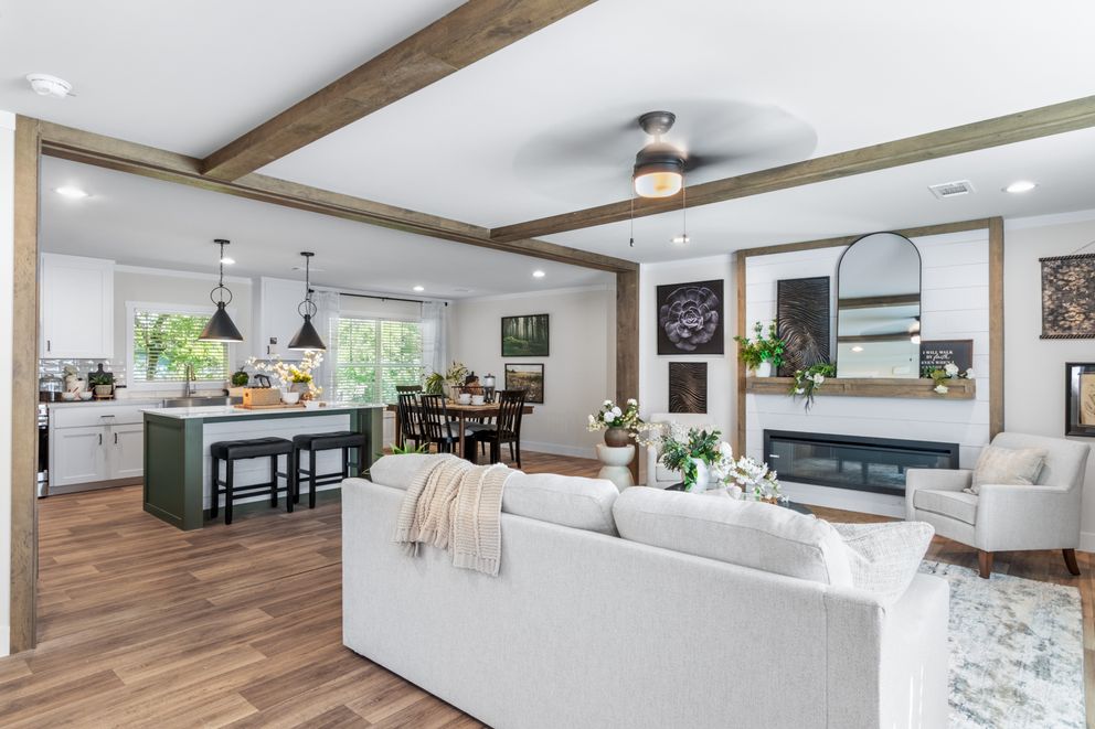 The FARM 4 FLEX ELITE Living Room. This Manufactured Mobile Home features 4 bedrooms and 3 baths.