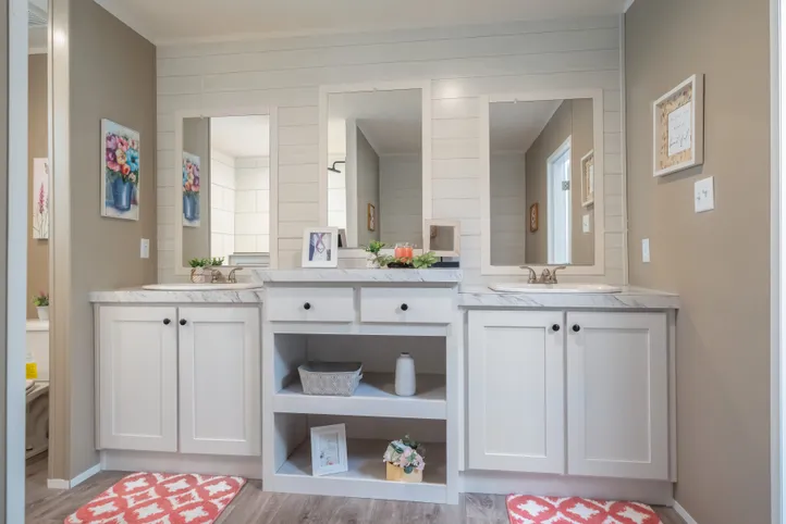 The ISLAND BREEZE Primary Bathroom. This Manufactured Mobile Home features 3 bedrooms and 2 baths.