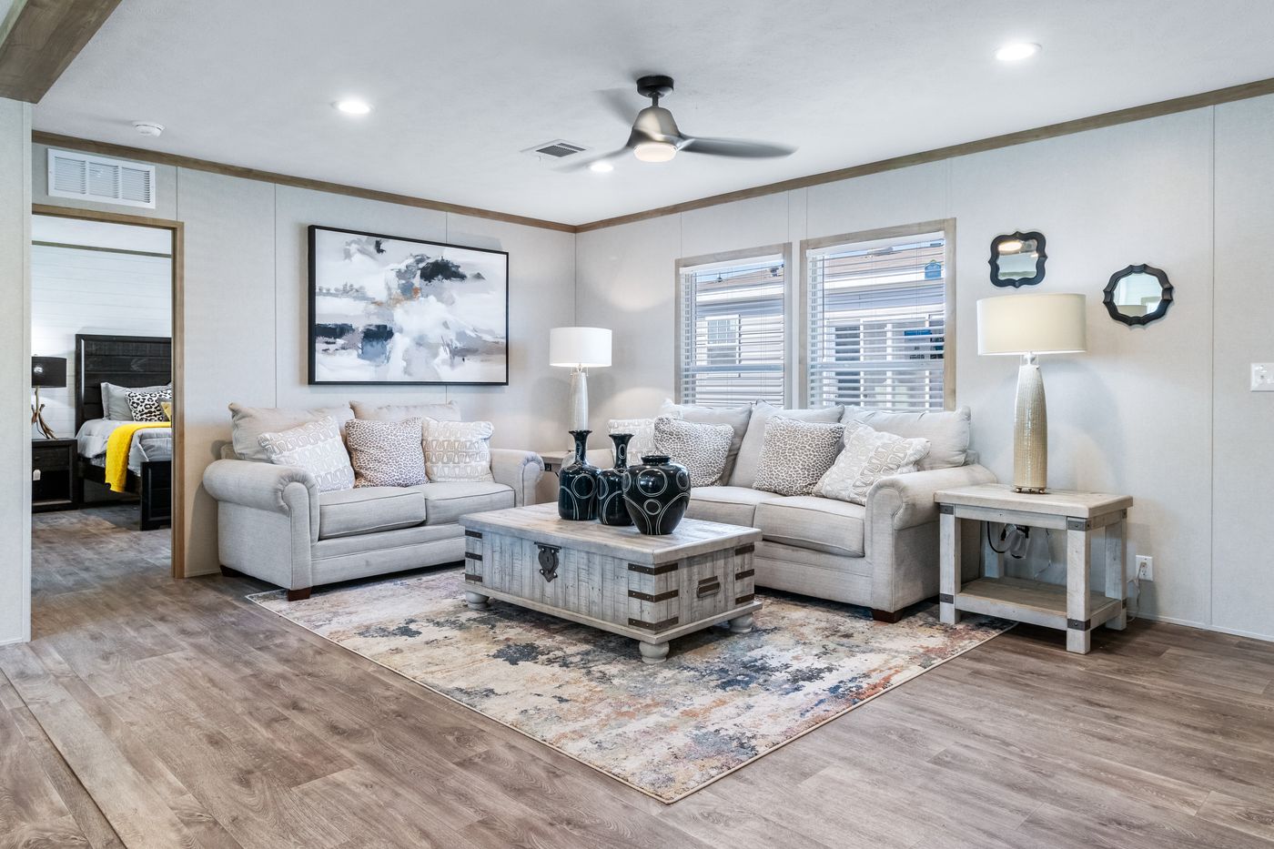 The PT 78 Living Room. This Manufactured Mobile Home features 3 bedrooms and 2 baths.
