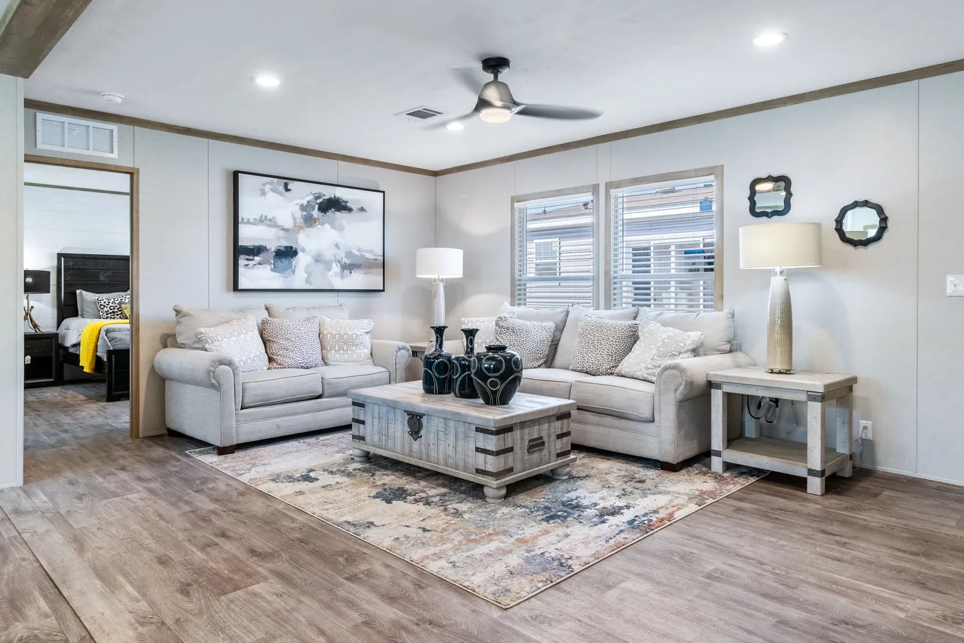 The PT 78 Living Room. This Manufactured Mobile Home features 3 bedrooms and 2 baths.