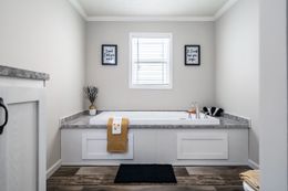 The BROOKLINE FLEX 32 WIDE Master Bathroom. This Manufactured Mobile Home features 4 bedrooms and 3 baths.