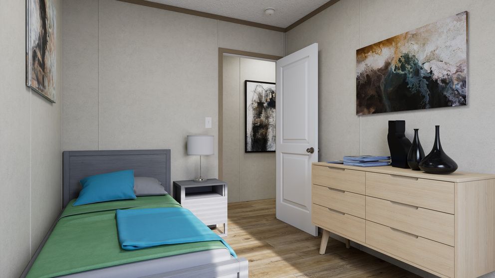 The 7216-CC03 HARBORVIEW 72 Guest Bedroom. This Manufactured Mobile Home features 3 bedrooms and 2 baths.