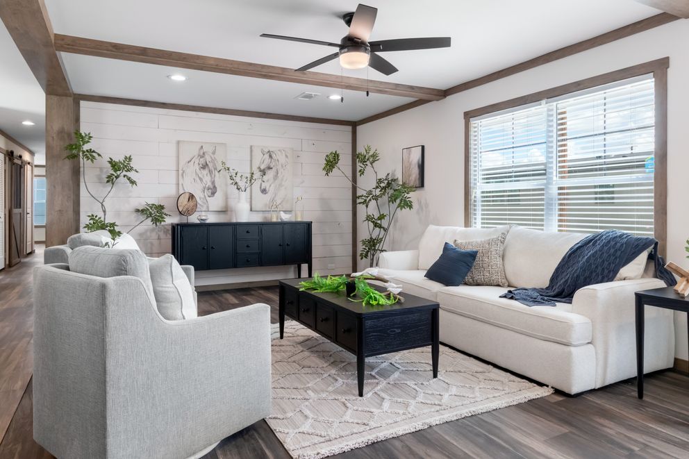 The FARM 4 FLEX Living Room. This Manufactured Mobile Home features 4 bedrooms and 3 baths.