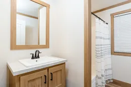 The WILDER Guest Bathroom. This Manufactured Mobile Home features 3 bedrooms and 2 baths.