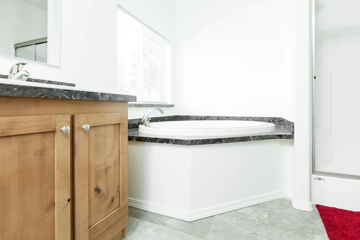 The 2025 COLUMBIA RIVER (NEW) Primary Bathroom. This Manufactured Mobile Home features 4 bedrooms and 2 baths.
