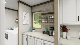 The SYDNEY Utility Room. This Manufactured Mobile Home features 3 bedrooms and 2 baths.