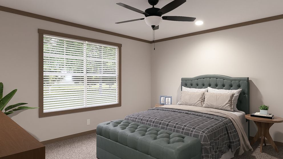 The WILDER Primary Bedroom. This Manufactured Mobile Home features 3 bedrooms and 2 baths.