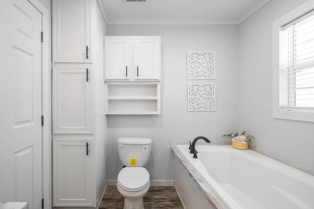 The THE DEWEY Primary Bathroom. This Manufactured Mobile Home features 3 bedrooms and 2 baths.