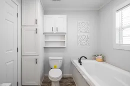 The THE DEWEY Primary Bathroom. This Manufactured Mobile Home features 3 bedrooms and 2 baths.