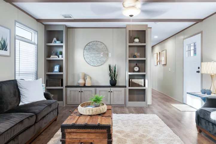The ANNIVERSARY 16763A Living Room. This Manufactured Mobile Home features 3 bedrooms and 2 baths.