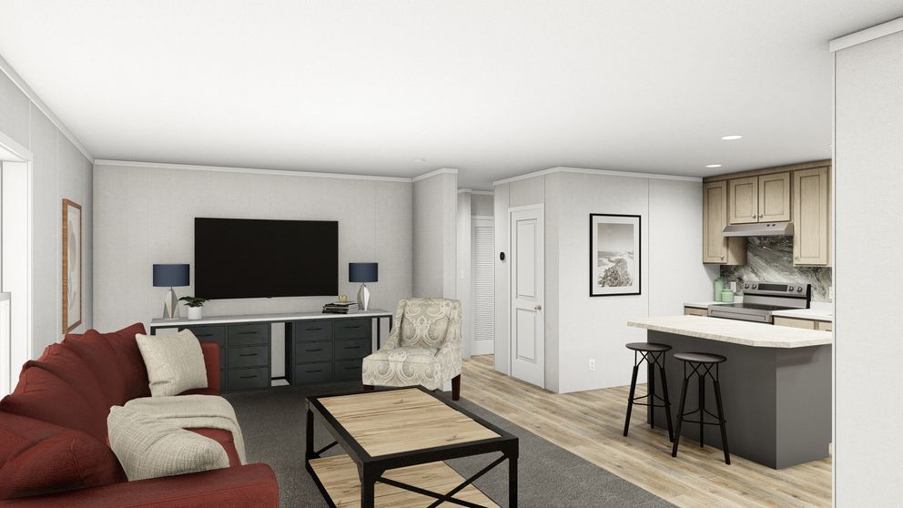 The TURQUOISE Living Room. This Manufactured Mobile Home features 2 bedrooms and 2 baths.