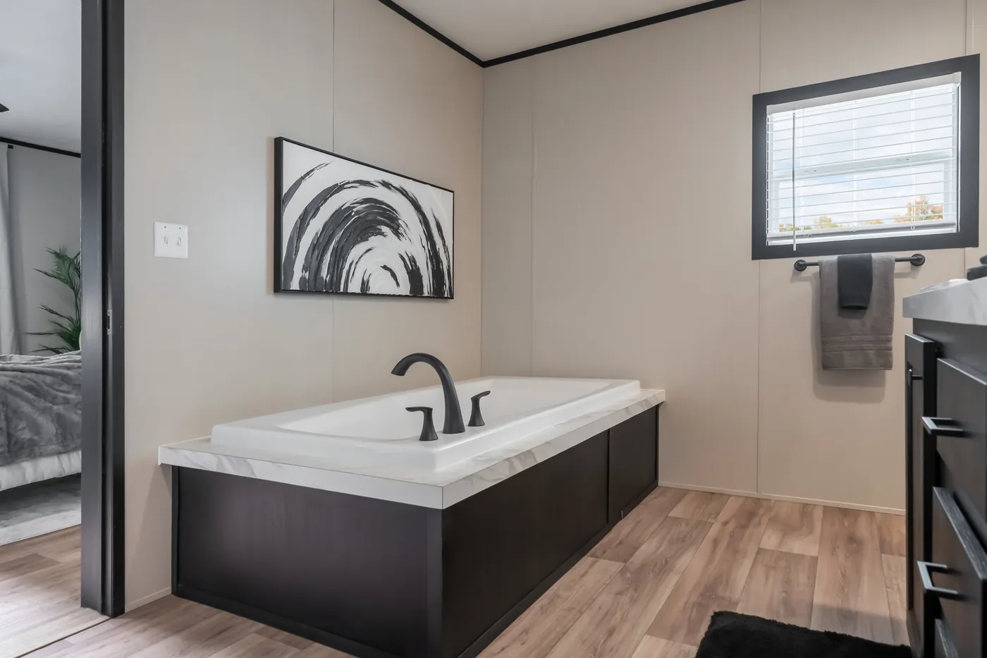 The THE ANNIVERSARY 2.1 Primary Bathroom. This Manufactured Mobile Home features 3 bedrooms and 2 baths.