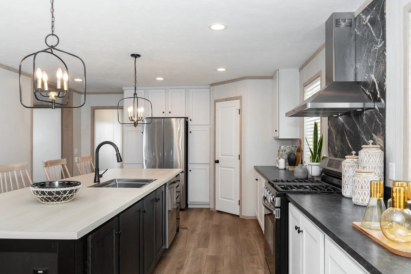 The 6032-5700 THE PULSE Kitchen. This Manufactured Mobile Home features 3 bedrooms and 2 baths.
