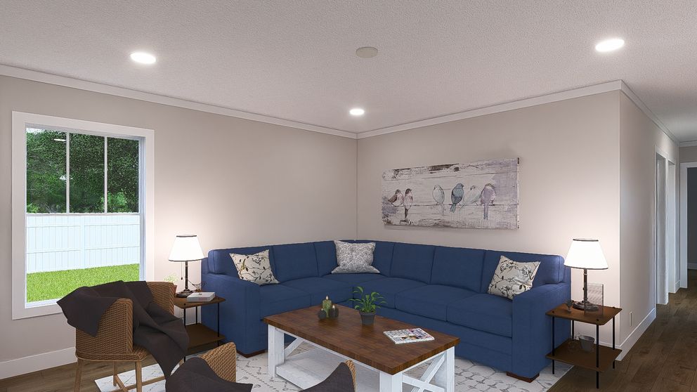 The MOVE ON UP Living Room. This Manufactured Mobile Home features 3 bedrooms and 2 baths.