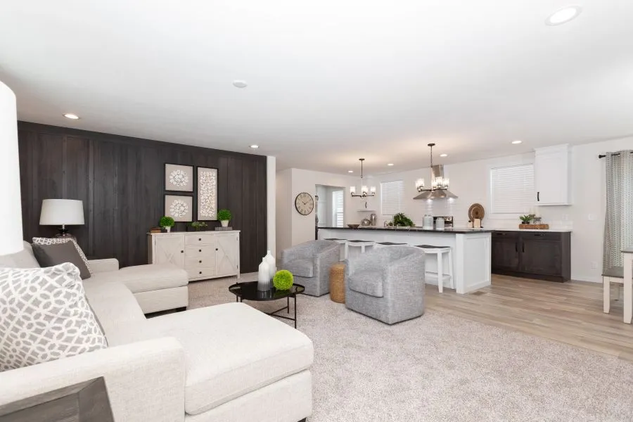 The BUTLER PLACE/6428-MS056 SECT Living Room. This Manufactured Mobile Home features 3 bedrooms and 3 baths.