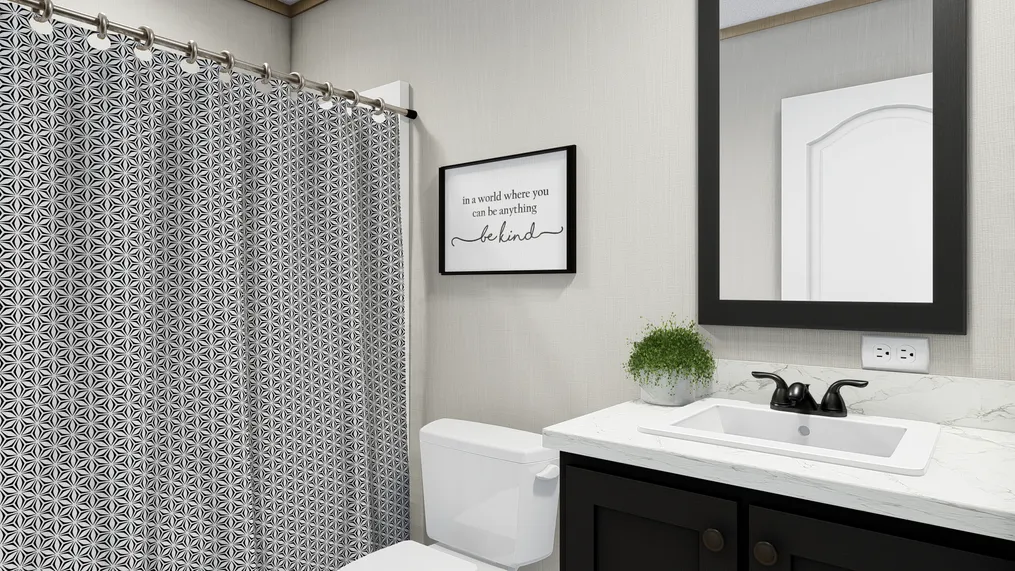 The RICHMOND Guest Bathroom. This Manufactured Mobile Home features 3 bedrooms and 2 baths.