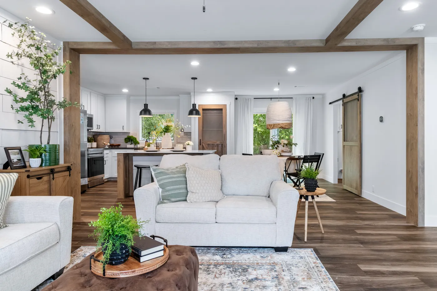 The SAWYER ELITE Living Room. This Manufactured Mobile Home features 3 bedrooms and 2 baths.