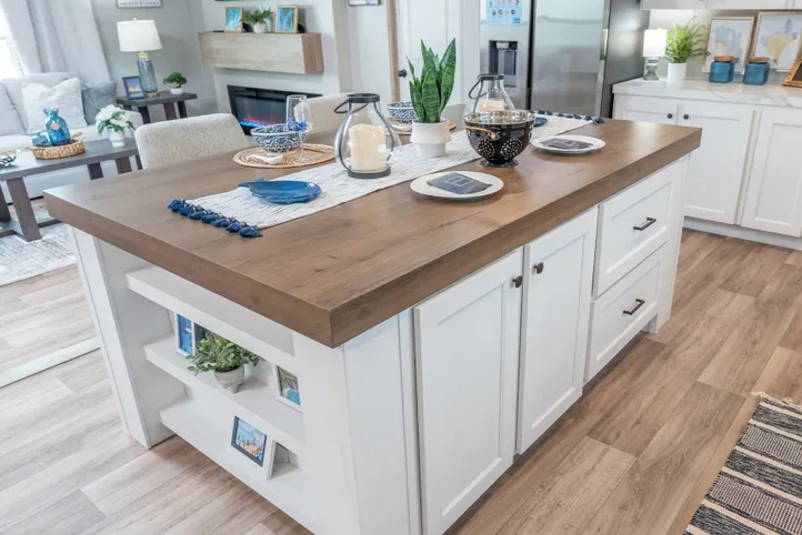 The EL SUENO BREEZE Kitchen. This Manufactured Mobile Home features 4 bedrooms and 2 baths.