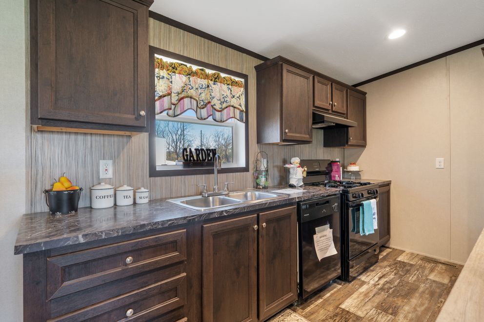 The GARNET Kitchen. This Manufactured Mobile Home features 3 bedrooms and 2 baths.